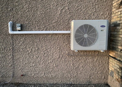 Provincial employee installing A/C